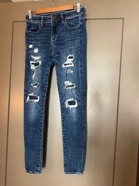 American Eagle Ripped Jeans Size 4 Distressed Patched Denim